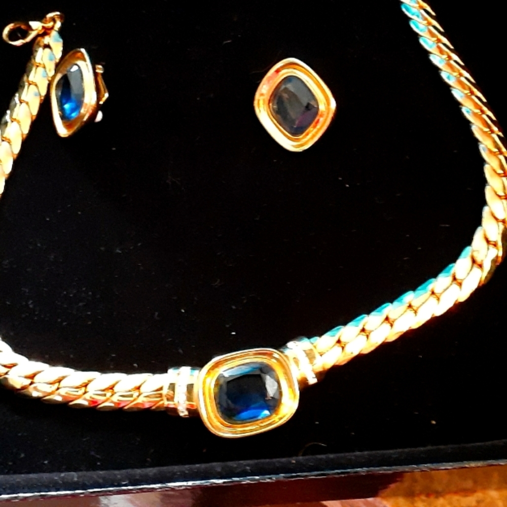 Ladies necklace with clip on sapphire like earring. Beautiful set. Gold tone